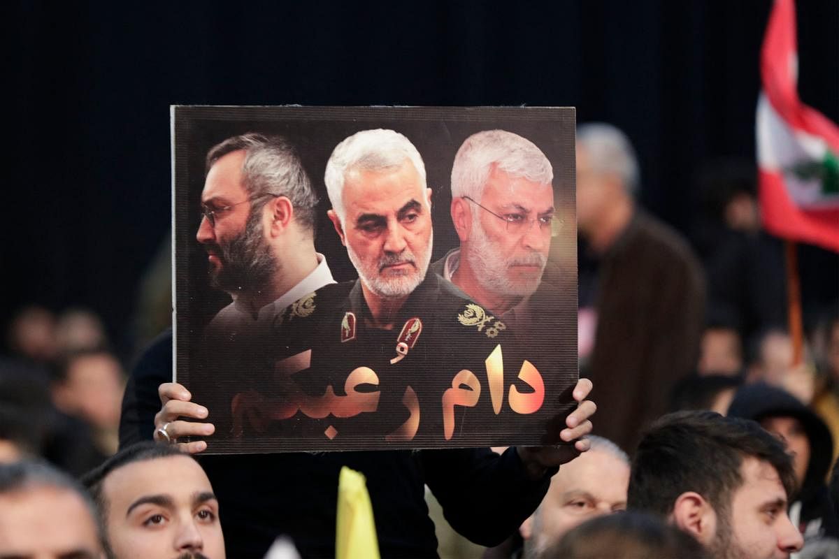 Supporters of the Shiite Hezbollah movement attend a commemoration ceremony in the Lebanese capital Beirut's southern suburbs marking the third anniversary of the US killing of top Iranian Revolutionary Guards commander Qasem Soleimani and Iraqi commander Abu Mahdi al-Muhandis. Credit: AFP Photo
