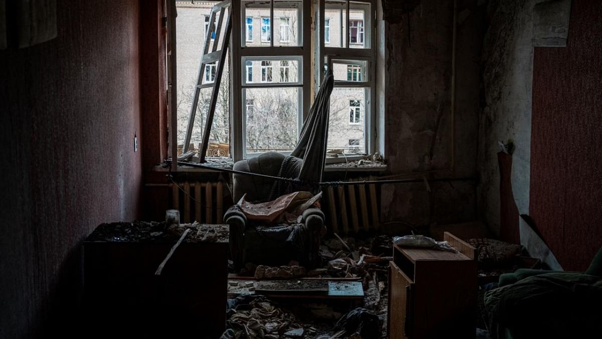 This photograph taken on January 5, 2023, shows the interior of an apartment damaged after a missile strike Chasiv Yar, eastern Ukraine, on January 5, 2023, amid the Russian invasion of Ukraine. Credit: AFP Photo