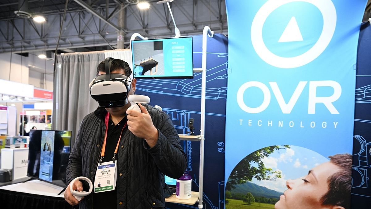 The company OVR Technology has created an accessory for VR headsets that treats users around a faux campfire to whiffs of smoke and toasting marshmallows. Credit: AFP Photo