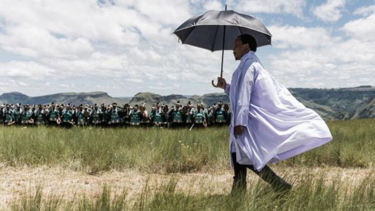 The leader of the Nazareth Baptist Church, from the Ekuphakameni group, Vukile Shembe arrives to take part in a cultural dance on the Nhlangakazi Holy Mountain in Ndwedwe 85 kilometres north of Durban. Credit: AFP Photo