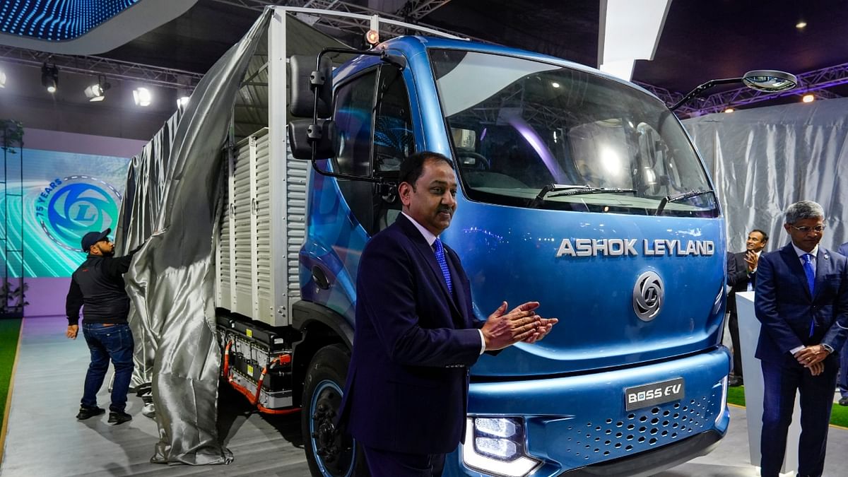 Ashok Leyland demonstrated its range of vehicles, which would be powered by electric and hydrogen options. In this photo, MD and CEO Shenu Agarwal is seen unveiling a truck, the Boss EV. Credit: PTI Photo