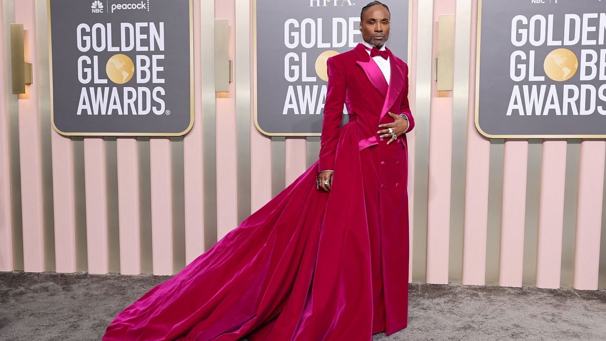 Billy Porter walked the red carpet in a vibrant magenta tuxedo dress and sparkly platform shoes. Credit: AFP Photo