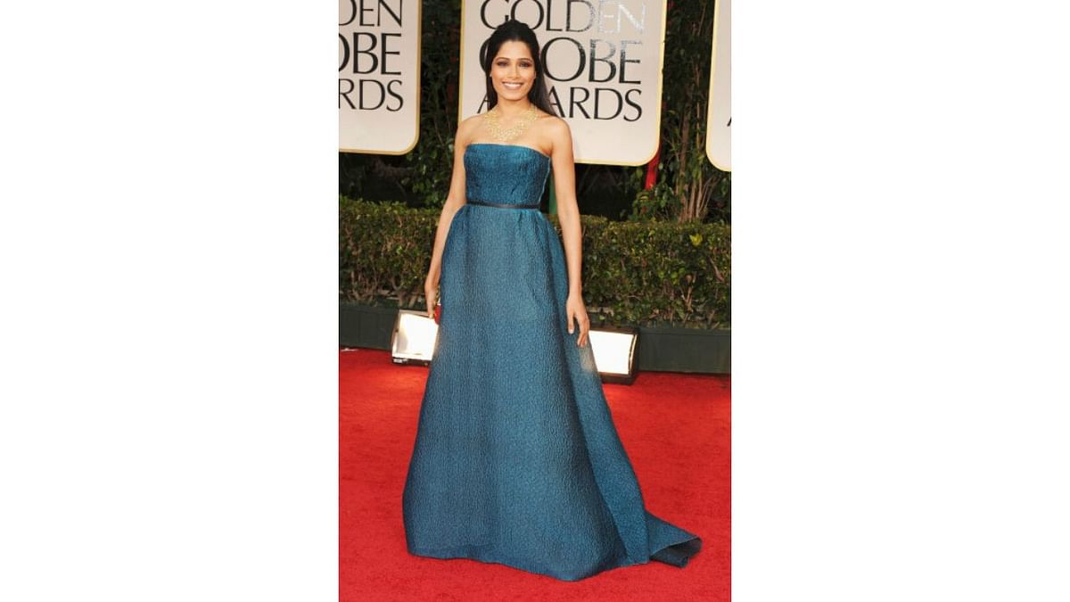 Frieda Pinto wowed all in a strapless Prada gown and Chopard jewels at the Golden Globes in 2012. Credit: Special Arrangement