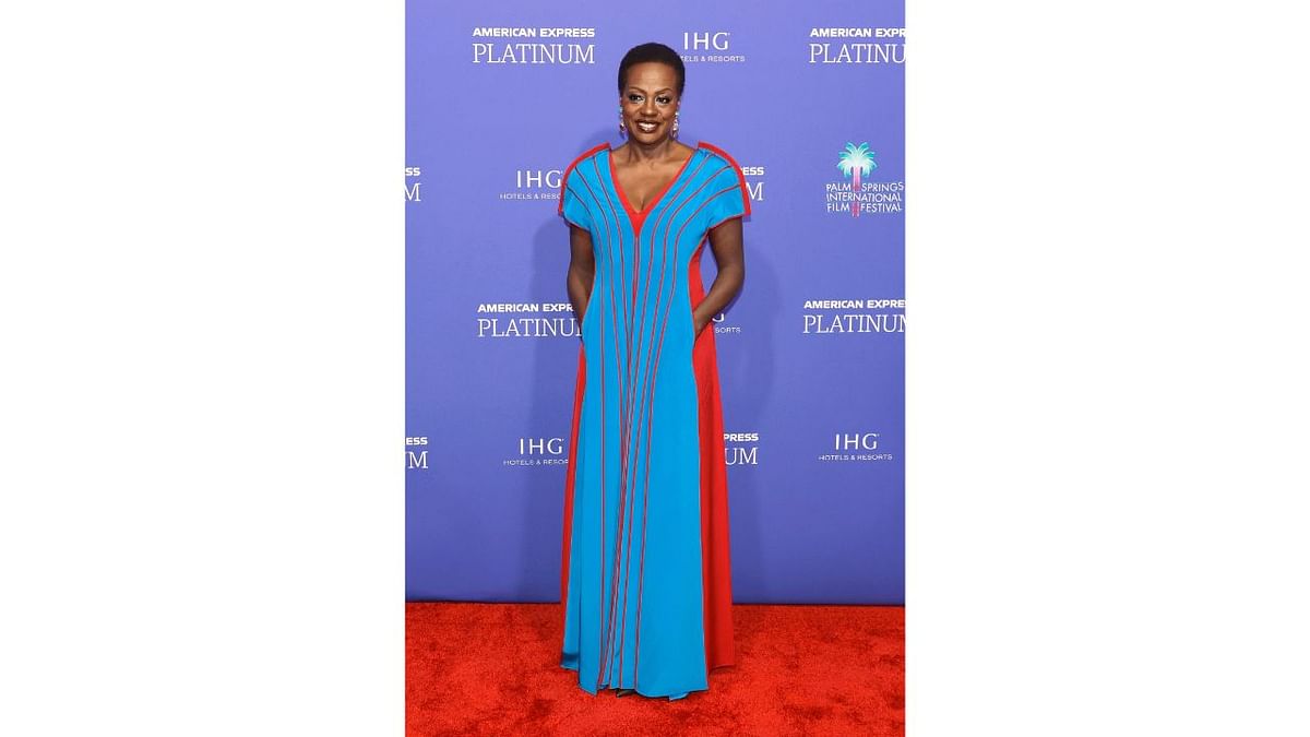 Viola Davis, who is nominated for best film drama actress for her star turn in 'The Woman King', looked regal in a royal blue one-shoulder Jason Wu gown with ruching. Credit: AFP Photo