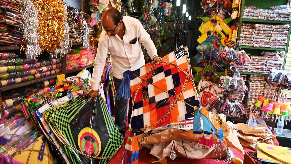 The kite market has been full of various kinds of kites printed with social messages, celebrities' photographs and superheroes to impress the shoppers. Credit: AFP Photo