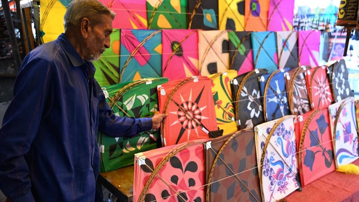 The nation is gearing up to celebrate 2023's first festival Makar Sankranti with great zeal. The markets are all decked up with kites, rangolis, flowers and other essentials. Like every year, this year also the much in demand amongst kite lovers are the kites with famous celebrity faces. Credit: AFP Photo