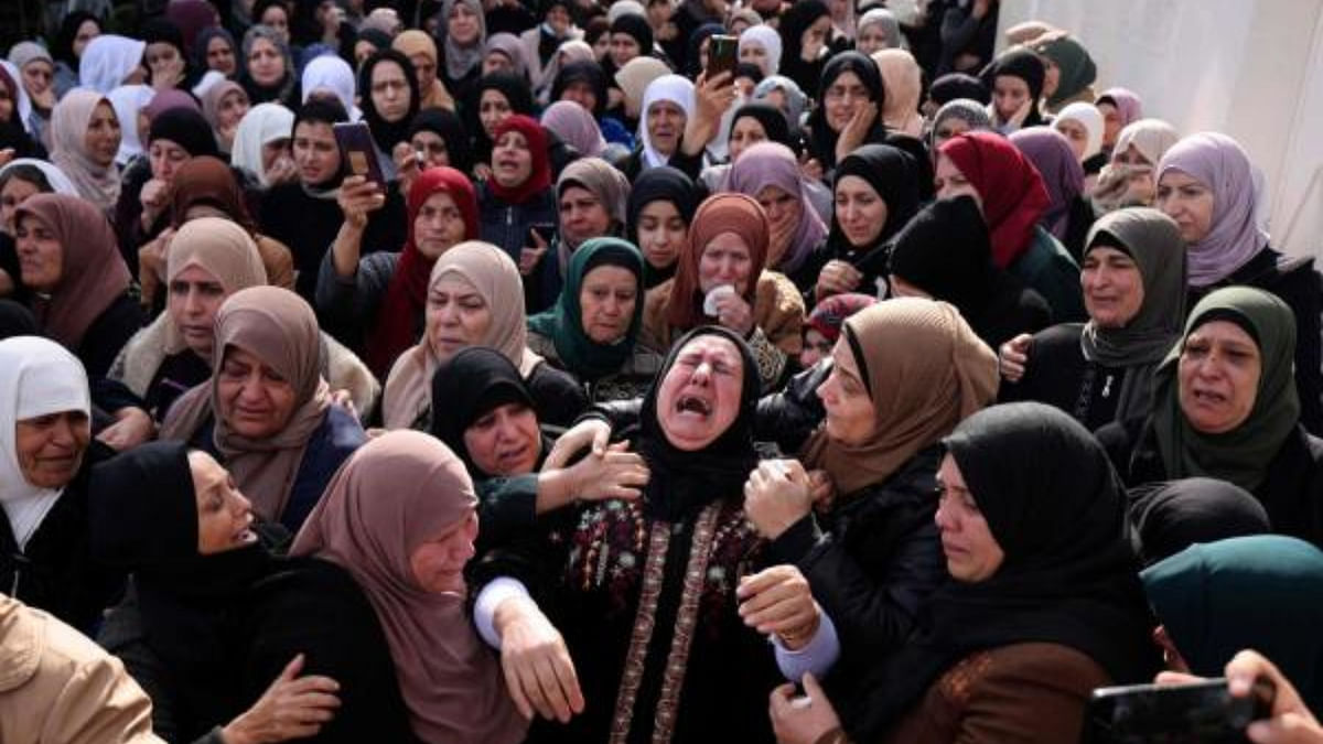 Palestinian relatives mourn the death of Abdulhadi Nazzal, reportedly killed during a raid by Israeli forces in Qabatia town. Credit: AFP Photo