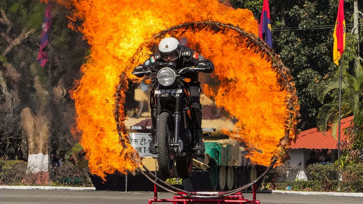 A member of the Army Service Corps (ASC) Tornadoes team performs during the 75th Army Day celebrations at Govinda Swamy Parade Ground in Bengaluru. Credit: PTI Photo