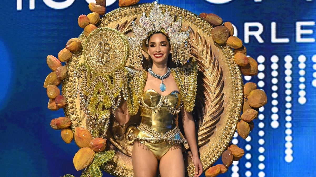 Alejandra Guajardo, the Salvadoran beauty queen strutted onto the stage wearing a bitcoin-inspired gold bodysuit at the Miss Universe pageant. Credit: Reuters Photo