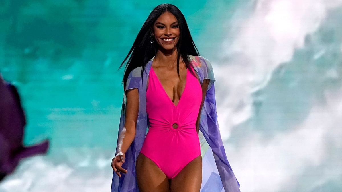 Miss Puerto Rico Ashley Carino was all smiles as she walked the ramp during the swimsuit round at the 71st Miss Universe competition. Credit: AFP Photo