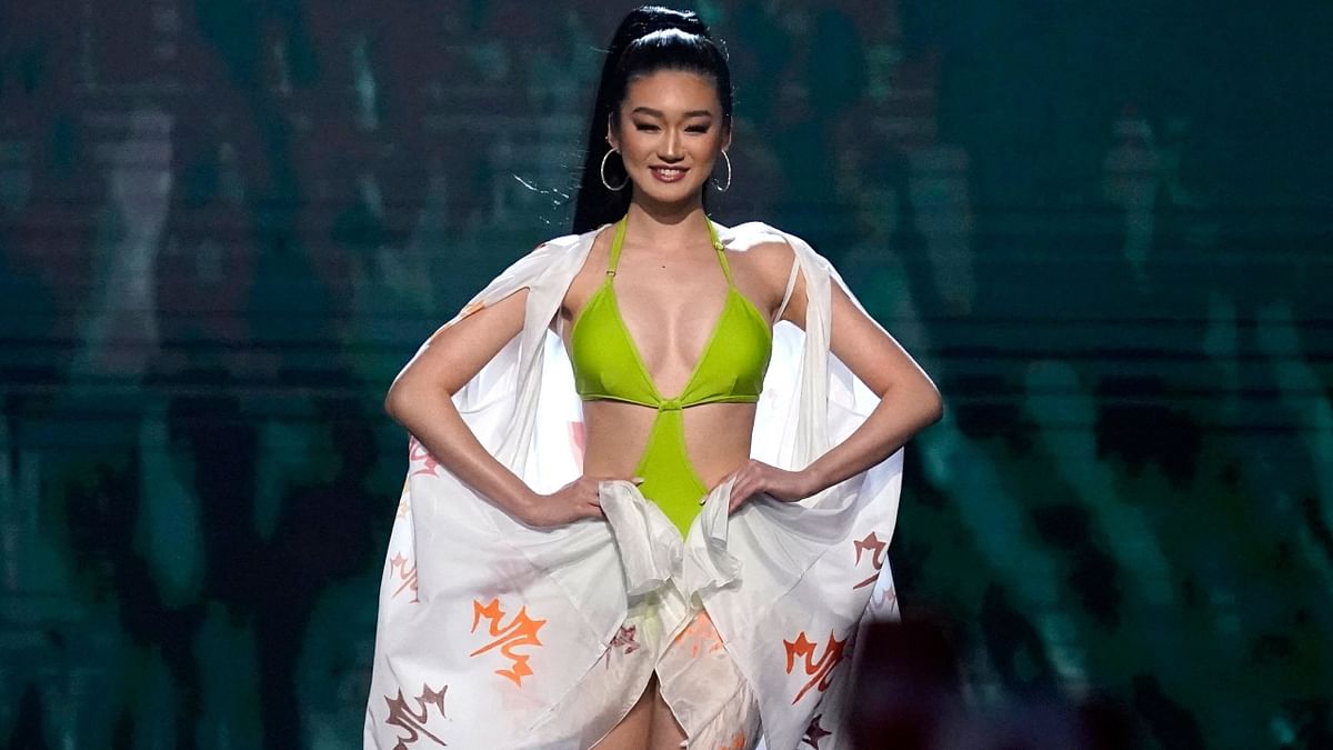 Miss Canada Amelia Tu wowed all in a green halter neck swimwear. Credit: AFP Photo