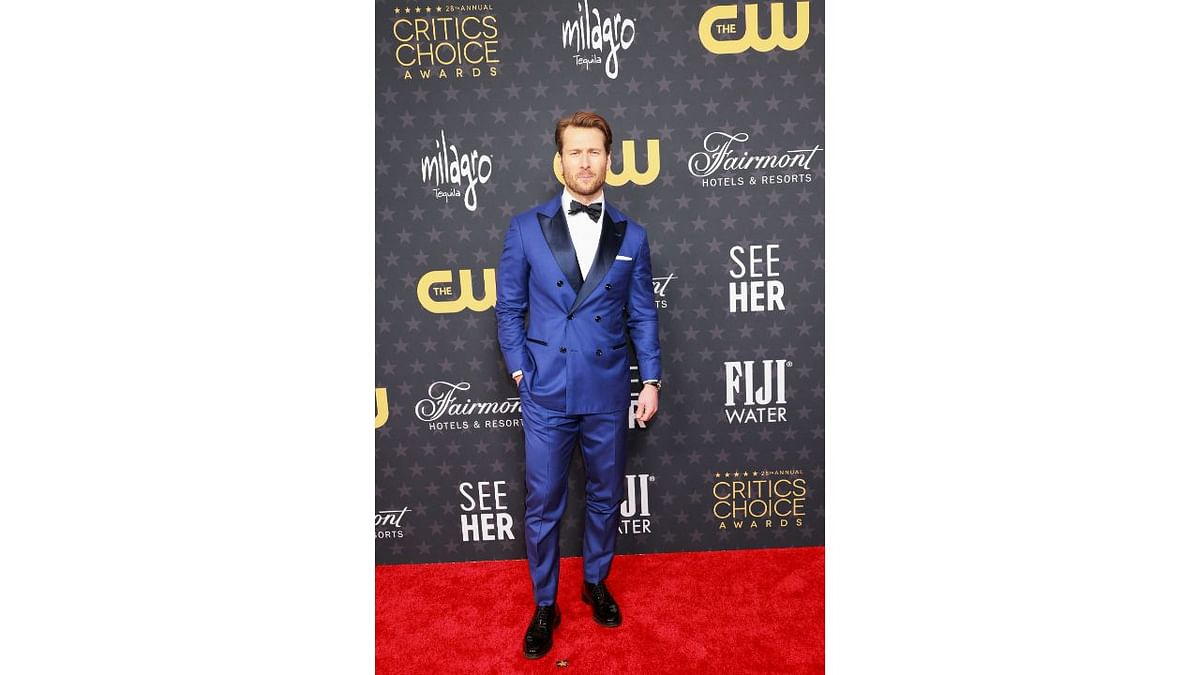 Glen Powell opted for a simple yet stylish blue suit with a white shirt, and a bow tie. Credit: Reuters Photo