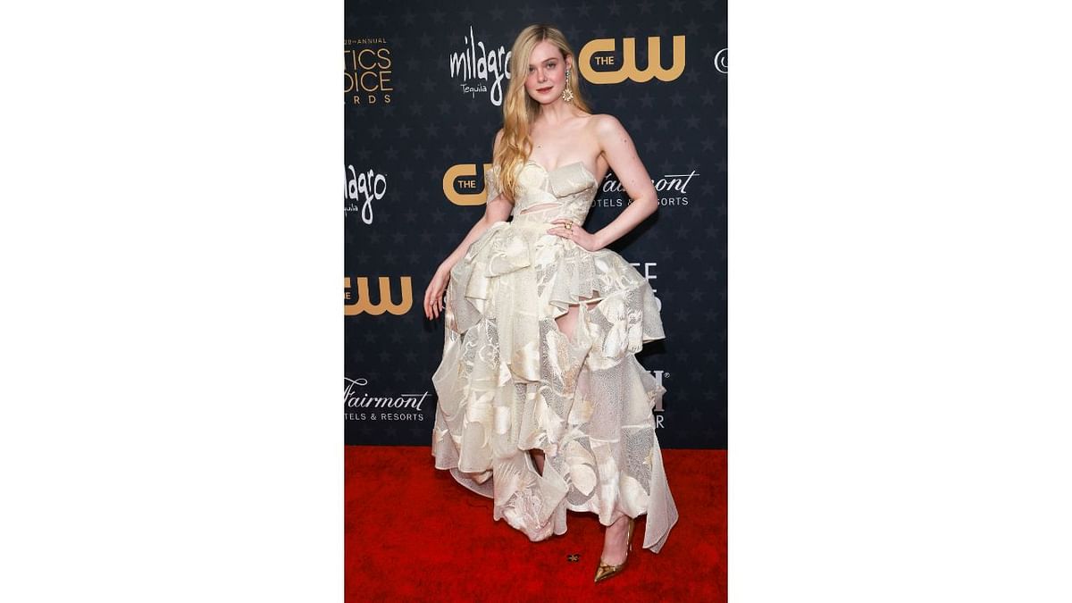 Elle Fanning chose to pleasantly surprise everyone in her cream-colored dress with asymmetric frills. Credit: Reuters Photo