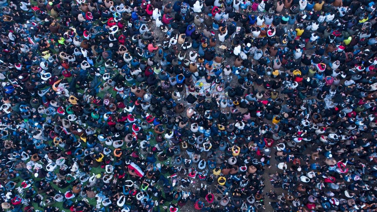 An aerial view shows Iraq supporters gathering in a designated fan zone in Iraq's southern city on January 16, 2023 to watch the Arabian Gulf Cup semi-final football match between Iraq and Qatar. Credit: AFP Photo