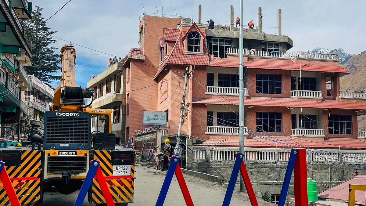 Before this, orders for the demolition of two hotels, Malari Inn and Mount View were issued and their scientific dismantling under CBRI supervision is underway. Credit: PTI Photo
