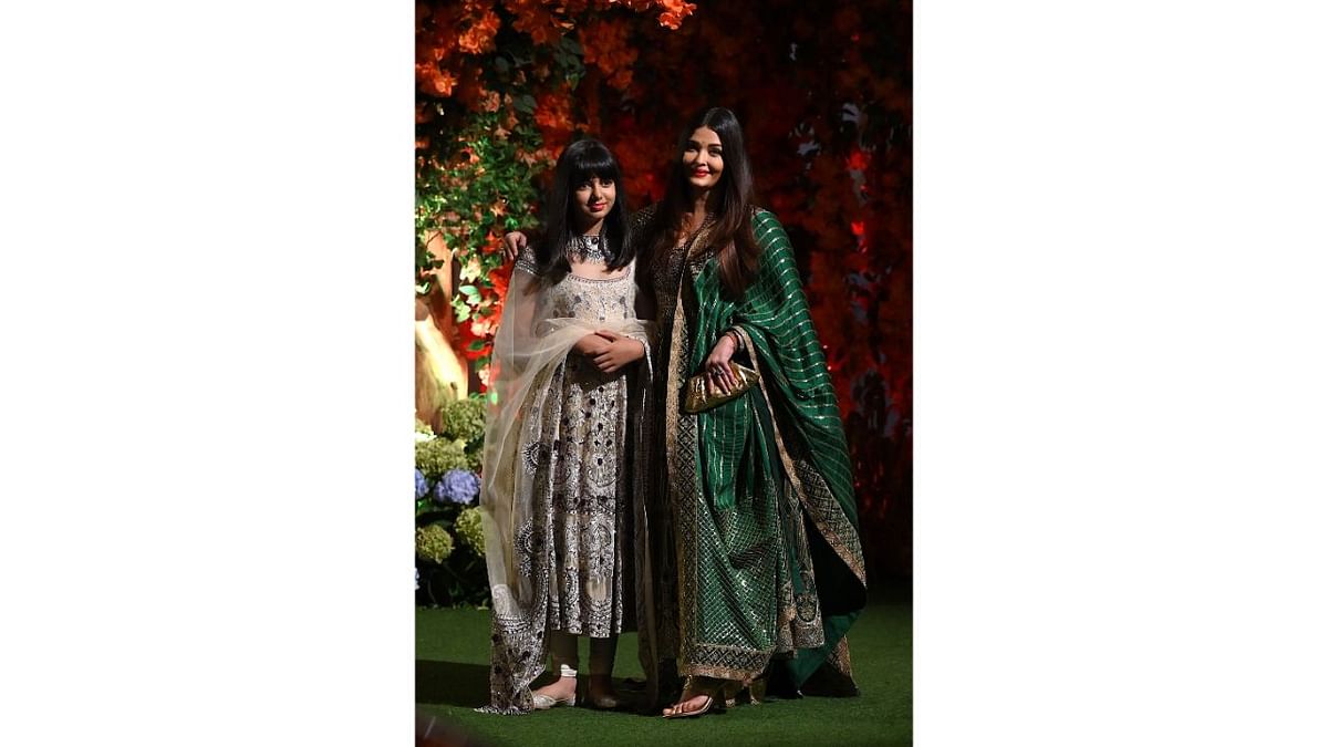 Donning a green anarkali, Aishwarya Rai graced the event with her daughter. Credit: AFP Photo