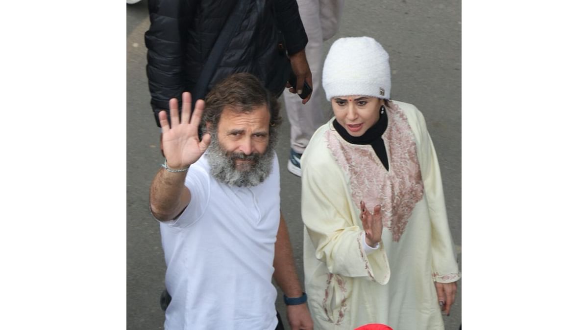 A glimpse of Urmila Matondkar and Rahul Gandhi during the foot march as it winds its way through Nagrota in Jammu. Credit: PTI Photo
