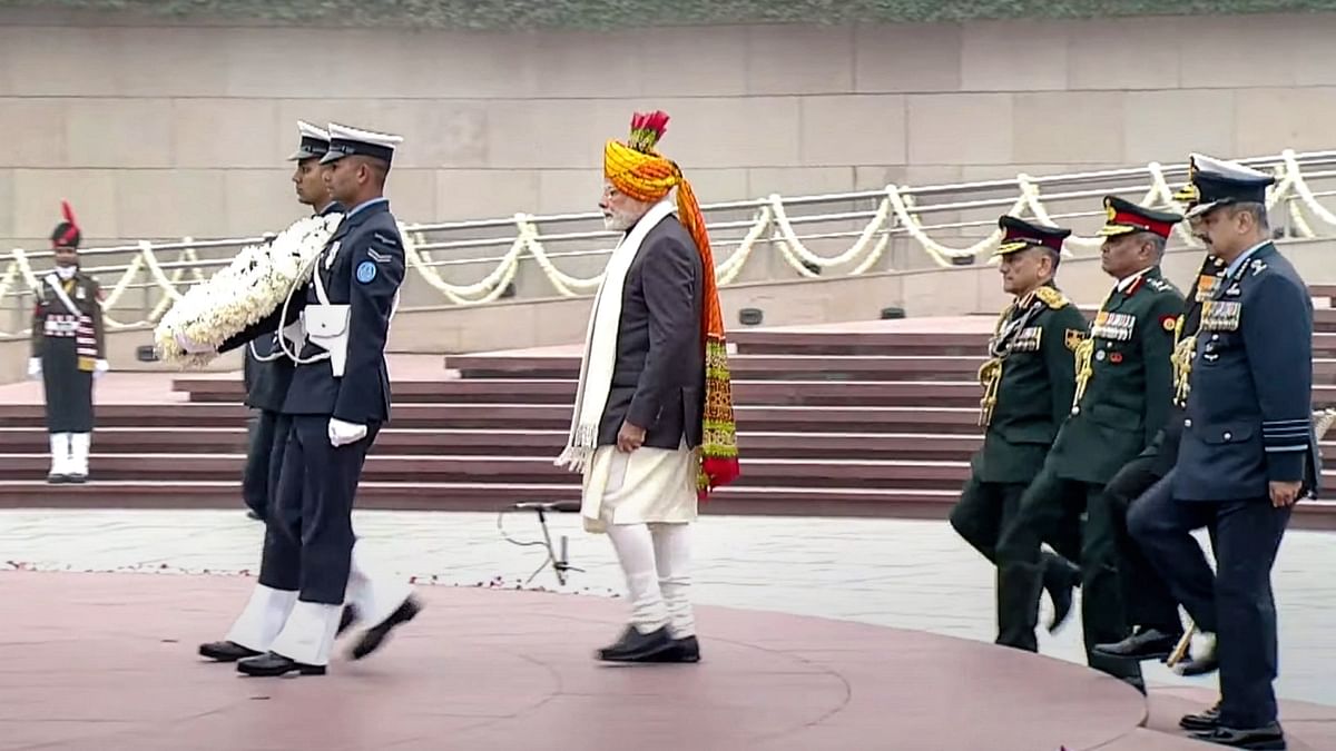 The 74th Republic Day celebrations commenced with an homage to fallen soldiers at the National War Memorial. Credit: PTI Photo