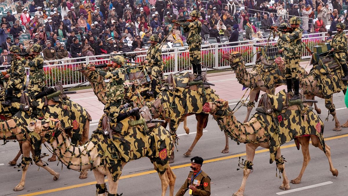 Camel mounted contingent of Border Security Force (BSF) marches past during the 74th Republic Day parade at the Kartavya Path, in New Delhi. Credit: PTI Photo