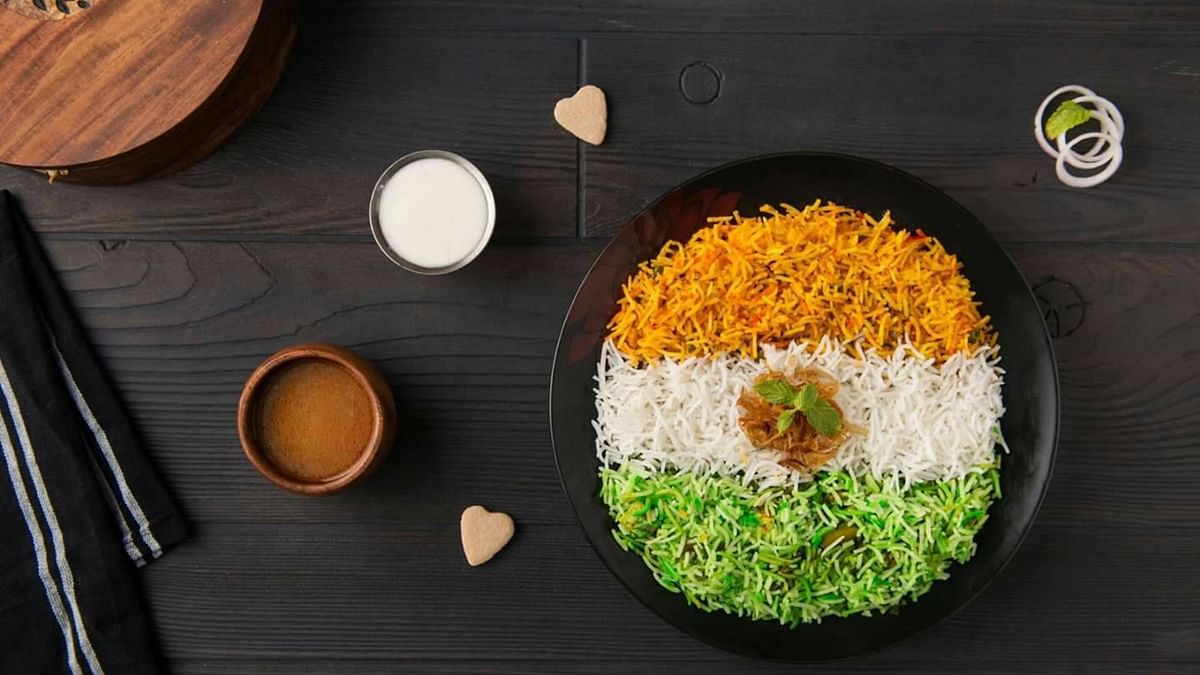 Tricolour Biryani: Biryani is definitely everyone's favourite food and trying tricolour biryani will enhance the mood and make the occasion more special. Credit: Twitter/@Inner_Chef