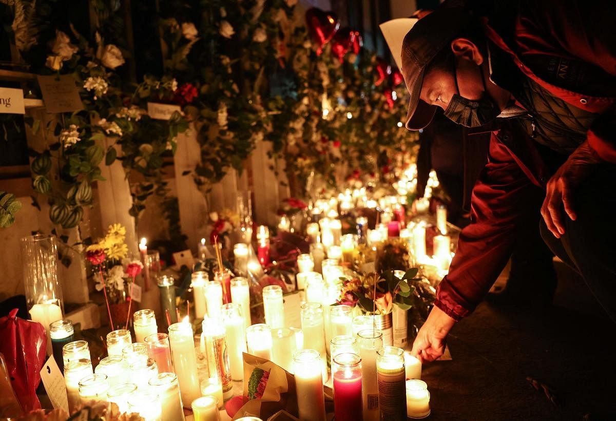 People attend a candlelight vigil at the growing memorial outside the Star Ballroom Dance Studio where a deadly mass shooting took place on January 25, 2023 in Monterey Park, California. Credit: Getty images via AFP