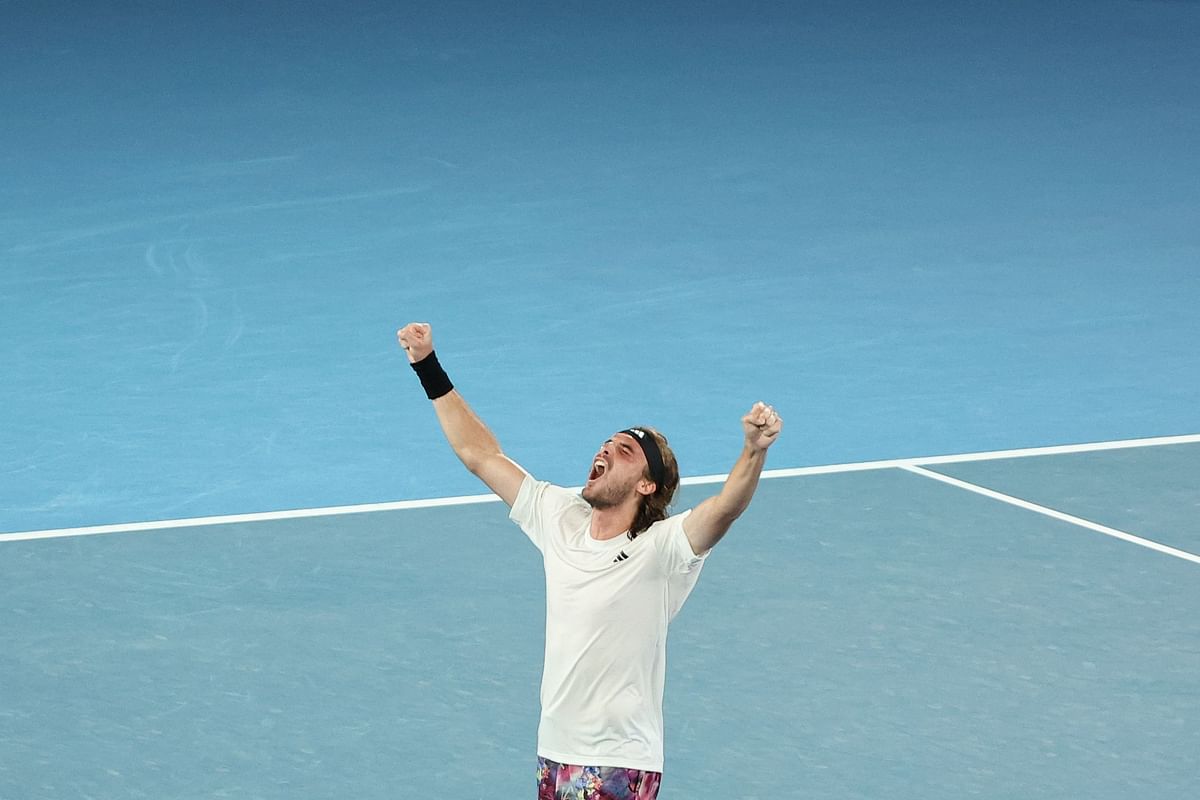 Greece's Stefanos Tsitsipas celebrates after victory against Italy's Jannik Sinner during their men's singles match on day seven of the Australian Open tennis tournament. Credit: AFP Photo