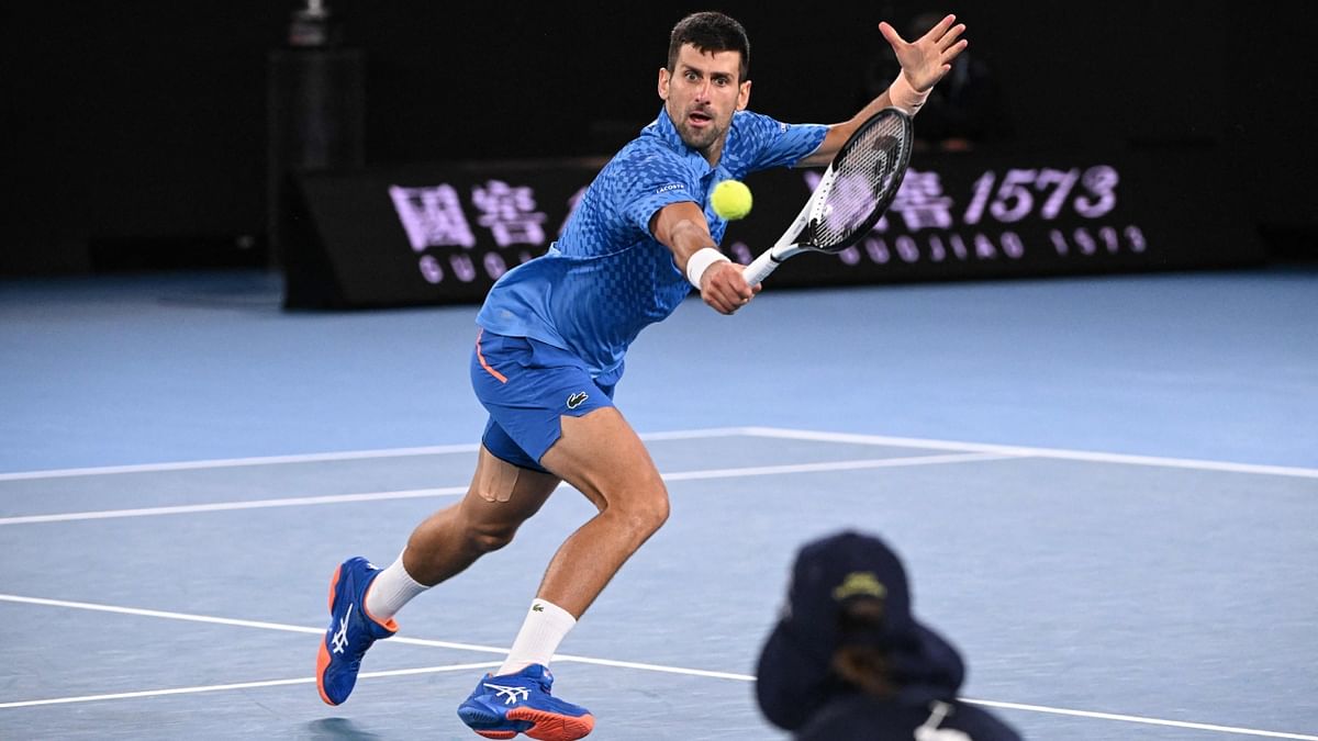 The Serb returns to world number one as he overcame a hamstring injury and off-court drama to sweep past the Greek third seed 6-3, 7-6 (7/4), 7-6 (7/5) on Rod Laver Arena. Credit: AFP Photo