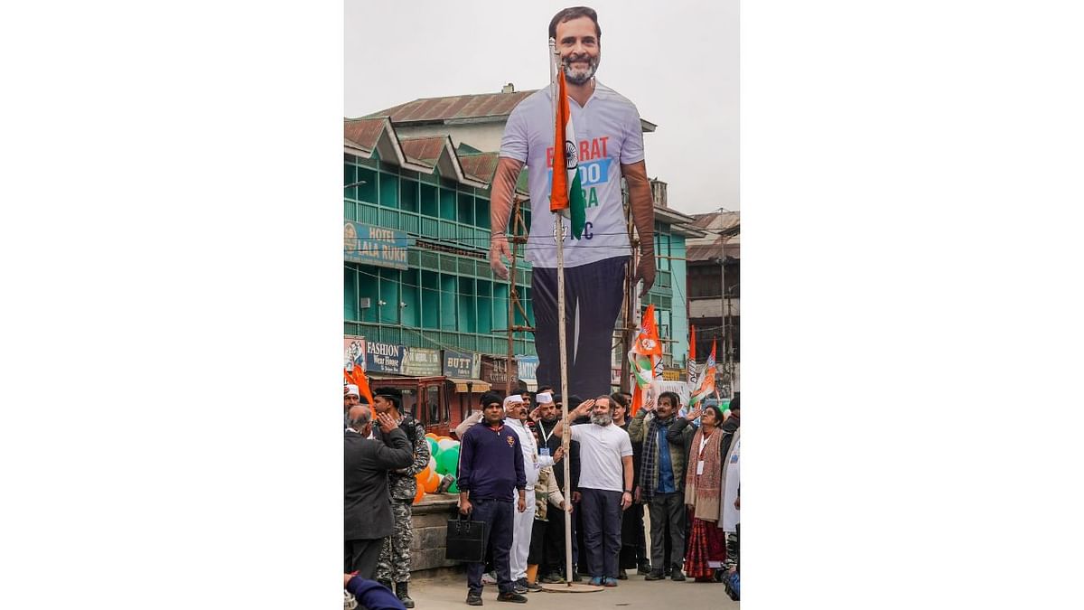 Congress leader Rahul Gandhi hoisted the national flag at the historic clock tower of Lal Chowk in the heart of Srinagar as part of the Kanyakumari-Kashmir leg of 'Bharat Jodo Yatra'. Credit: PTI Photo