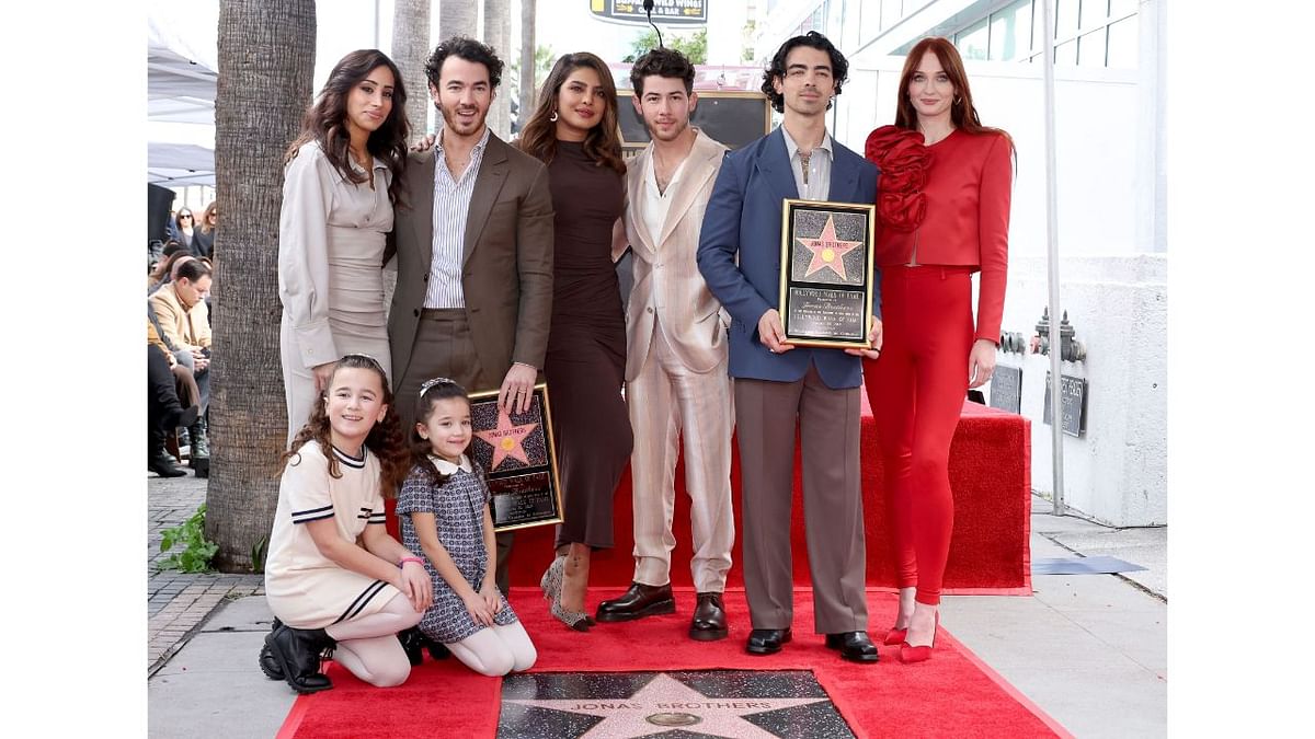 In a glittery ceremony, pop rock band Jonas Brothers, comprising Nick, Kevin, and Joe Jonas, received a star on the Hollywood Walk of Fame. The event saw several celebrities in attendance. Credit: Getty Images