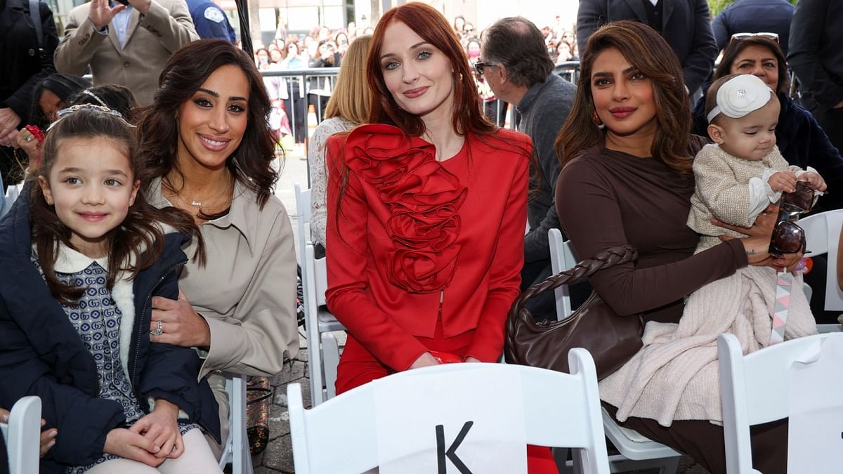 Danielle Jonas, Sophie Turner and Priyanka pose for a photo during the event. Credit: Reuters Photo
