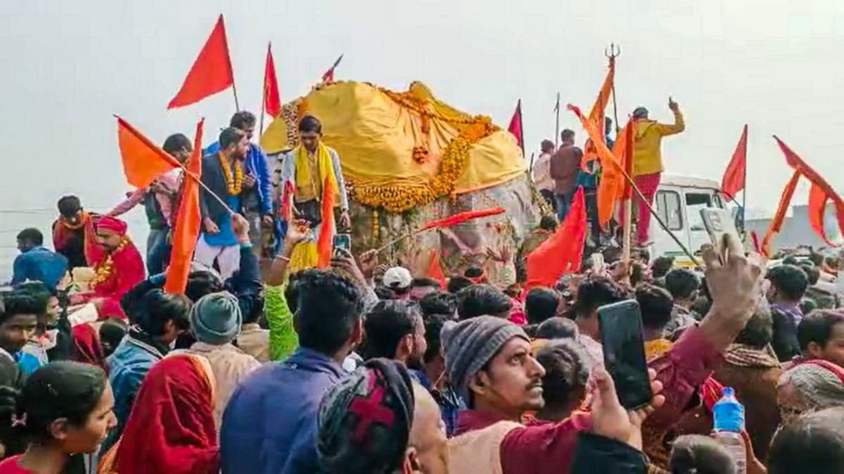 The holy stones were welcomed by priests and locals who decorated the boulders with garlands and offered prayers before handing them over to the Shri Ram Janmabhoomi Teerth Kshetra Trust. Credit: PTI Photo