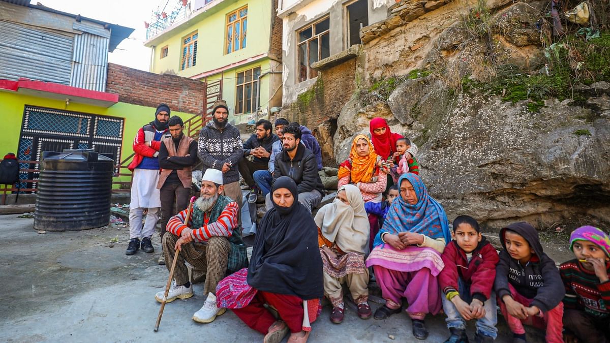 Nineteen families were evacuated after their homes developed cracks at a village in Doda district, Jammu and Kashmir. Credit: PTI Photo