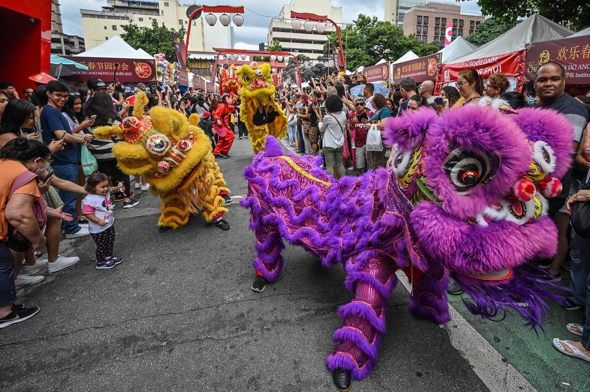 The dragon dance is performed during celebrations to mark the Chinese Lunar New Year, which welcomes the Year of the Rabbit. Credit: AFP Photo