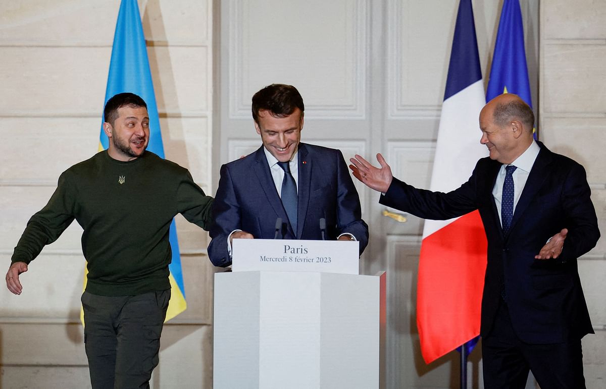 France's President Emmanuel Macron (C), Ukraine's President Volodymyr Zelensky (L) and Germany's Chancellor Olaf Scholz react during a joint statement at the presidential Elysee Palace in Paris. Credit: AFP Photo
