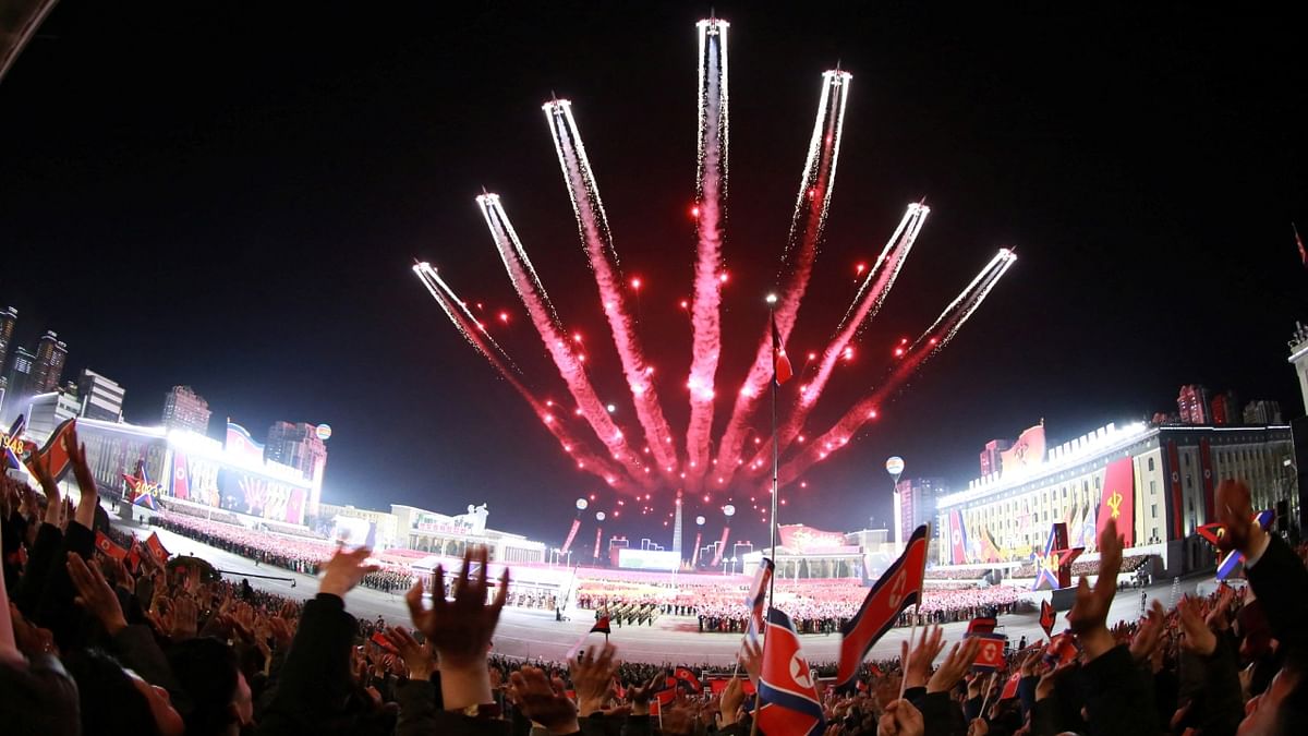 People watch fireworks during a military parade to mark the 75th founding anniversary of North Korea's army, in Pyongyang, North Korea. Credit: Reuters Photo