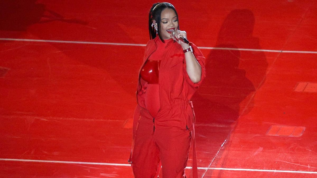 Pop and R&B superstar Rihanna made a grand return to the stage, floating high above Super Bowl field, enthralling the  crowd with a fast-paced medley of her hits and revealing her baby bump (February 12). Credit: AFP Photo