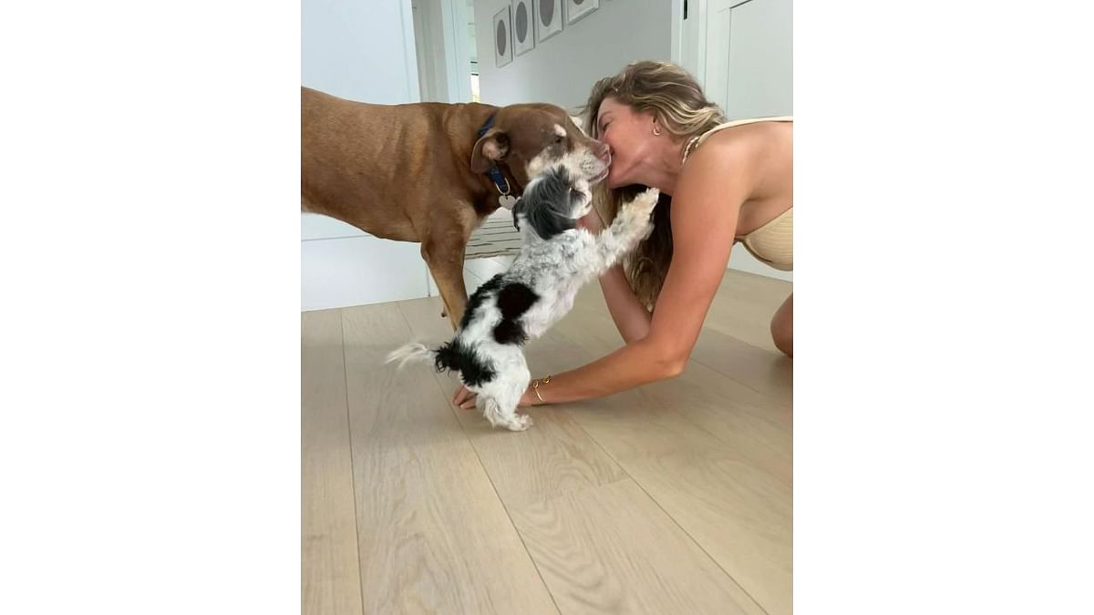 Supermodel Gisele Bundchen shared cute photos of herself celebrating the Valentine's Day with pets, Fluffy and Lua. Credit: Instagram/@gisele