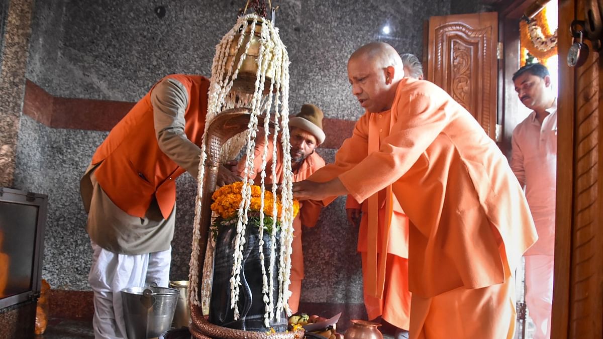 Uttar Pradesh Chief Minister Yogi Adityanath offers prayers at Mansarover Mandir on the occasion of 'Maha Shivratri', in Gorakhpur. Credit: PTI Photo