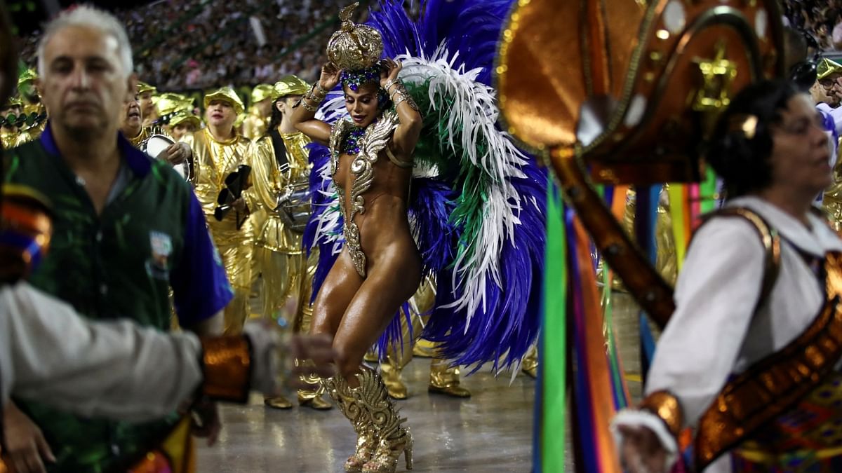 A reveller grooves on the first day of the Carnival parade at Anhembi Sambadrome in Sao Paulo, Brazil. Credit: Reuters Photo