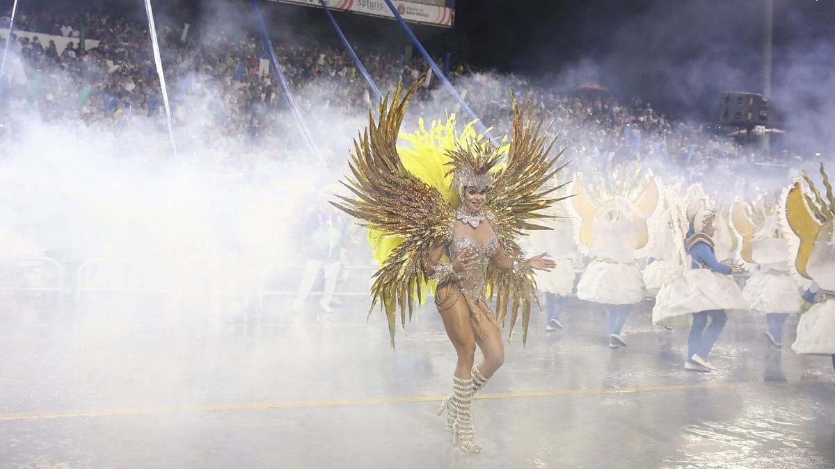 A reveller from Unidos de Vila Maria school performs during the first night of the Carnival parade at Anhembi Sambadrome in Sao Paulo, Brazil. Credit: Reuters Photo