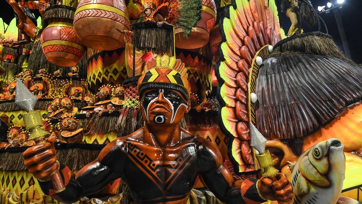 Revellers of the Academicos do Tatuape samba school perform during the first night of carnival, at Sambadrome, in Sao Paulo, Brazil. Credit: AFP Photo