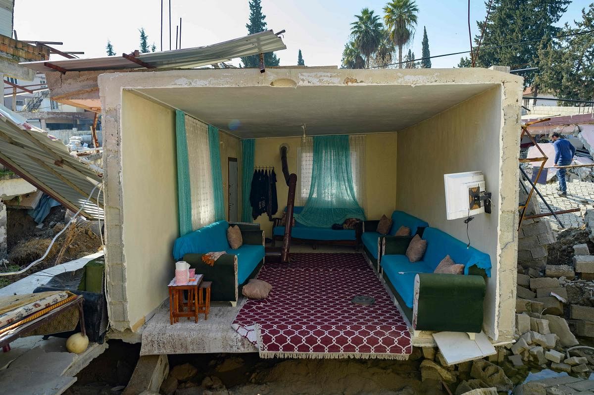 A view of a living room in Demirkopru, a small detroyed Turkish village now divided by a large crack in Hatay. Photo Credit: AFP Photo