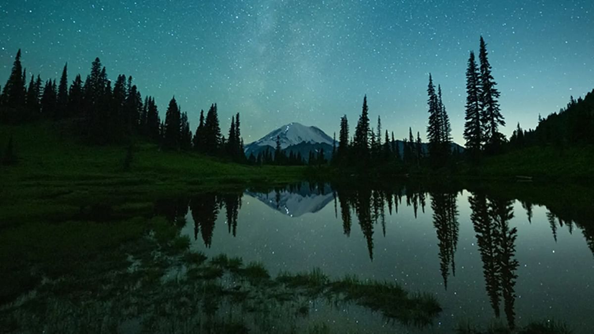 Honorable Mention: Photographer W Kent Williamson snapped this image at about 03:40 am on a summer morning from Tipsoo Lake in Mount Rainier National Park, Washington. Credit: W Kent Williamson
