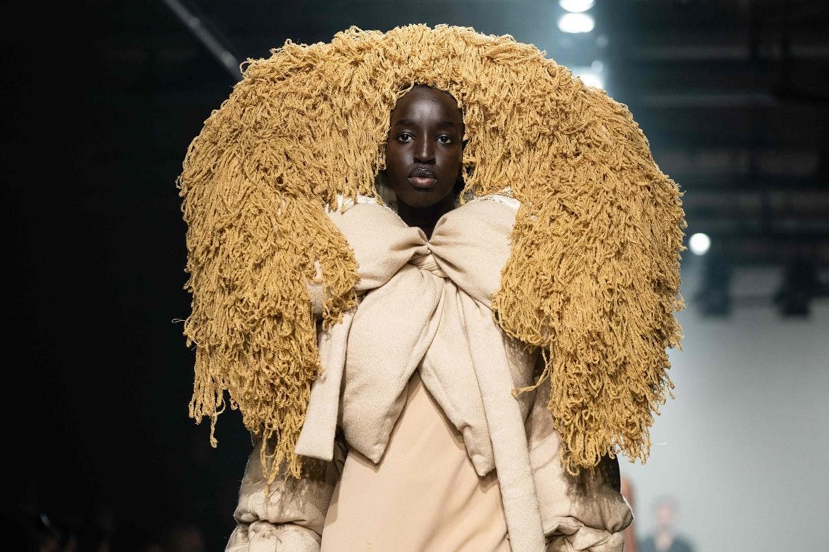 A model presents a creation for fashion brand Asai during the catwalk show for their Autumn/Winter 2023 collection on the fourth day of the London Fashion Week. Credit: Reuters Photo
