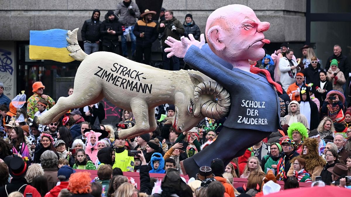 A float depicting Chancellor Olaf Scholz is being rammed forwards by a goat with a Ukrainian flag on its tail and the name of Maria Strack-Zimmermann also took plenty of heat at the carnival. Credit: AFP Photo