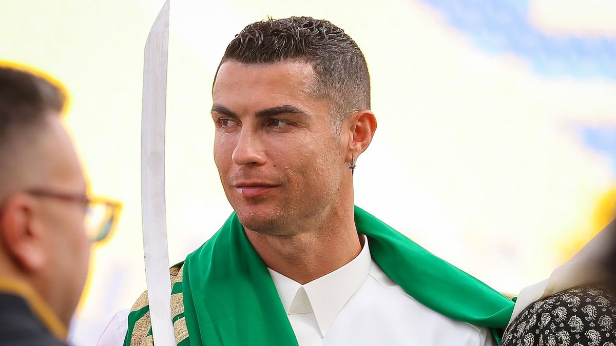 Dressed in traditional attire, Cristiano Ronaldo is seen holding a sword during Saudi Arabia's Founding Day celebrations. Credit: Reuters Photo