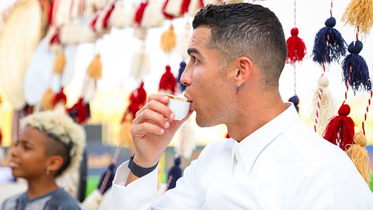 Cristiano Ronaldo is seen enjoying a drink during Saudi Arabia's Founding Day celebrations at Al-Nassr Football Club in Riyadh, Saudi Arabia. Credit: Reuters Photo