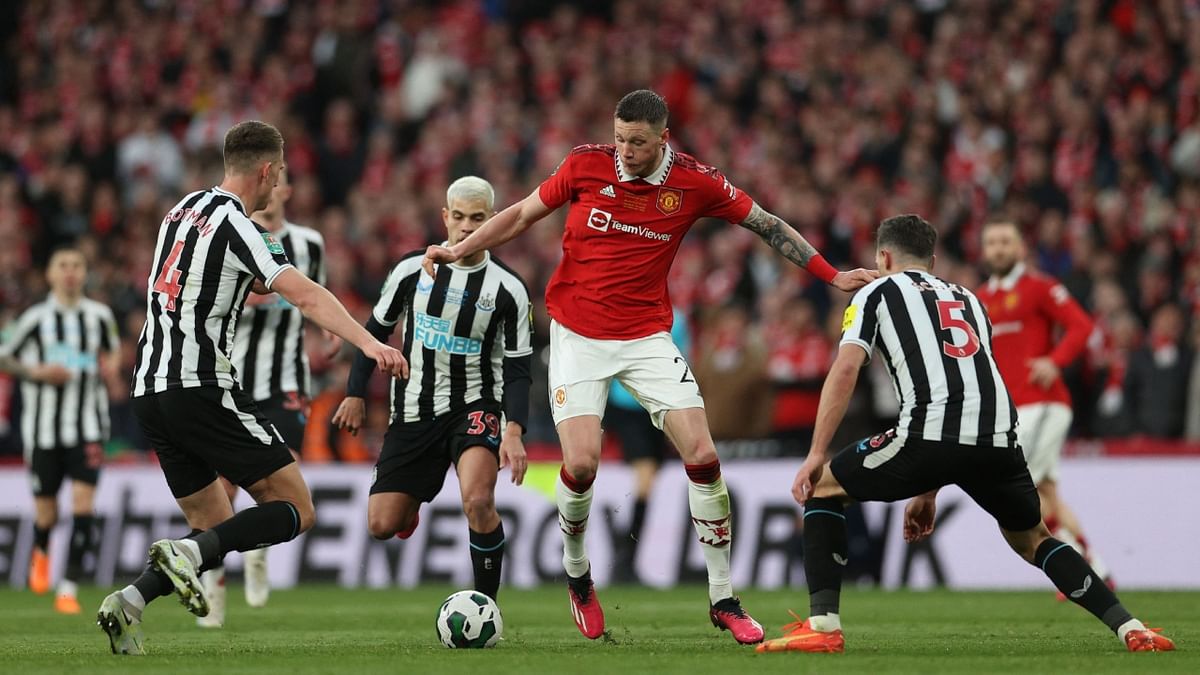 Manchester United crushed Newcastle United's hopes of a claiming a first domestic trophy for nearly 70 years with a clinical 2-0 victory in the League Cup final at Wembley in London. Credit: AFP Photo