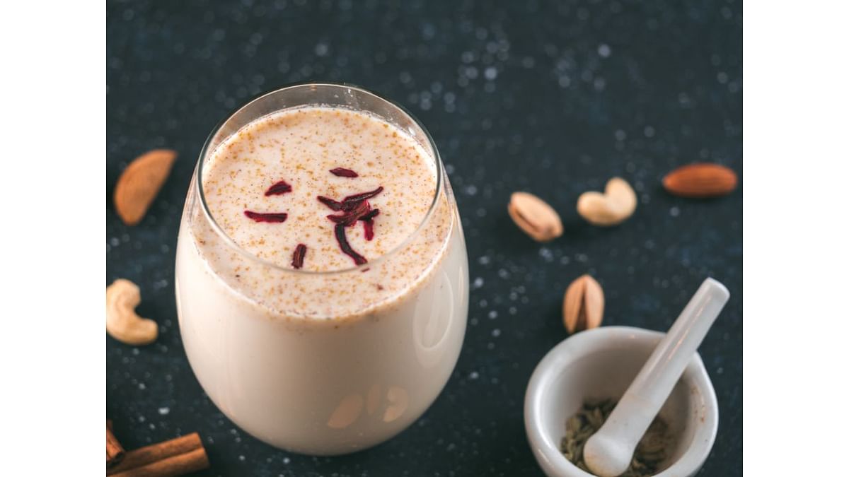 'Thandai' is a popular beverage that is made with cooling spices, nuts, seeds, rose petals, and milk. It is a 'must' at Holi parties. Credit: Getty Images