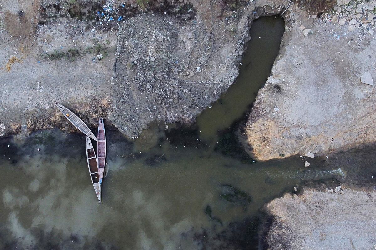 An aerial view shows the drought-induced drop in the water levels at the Abu Lehya river in the Dhi Qar province. Credit: AFP Photo
